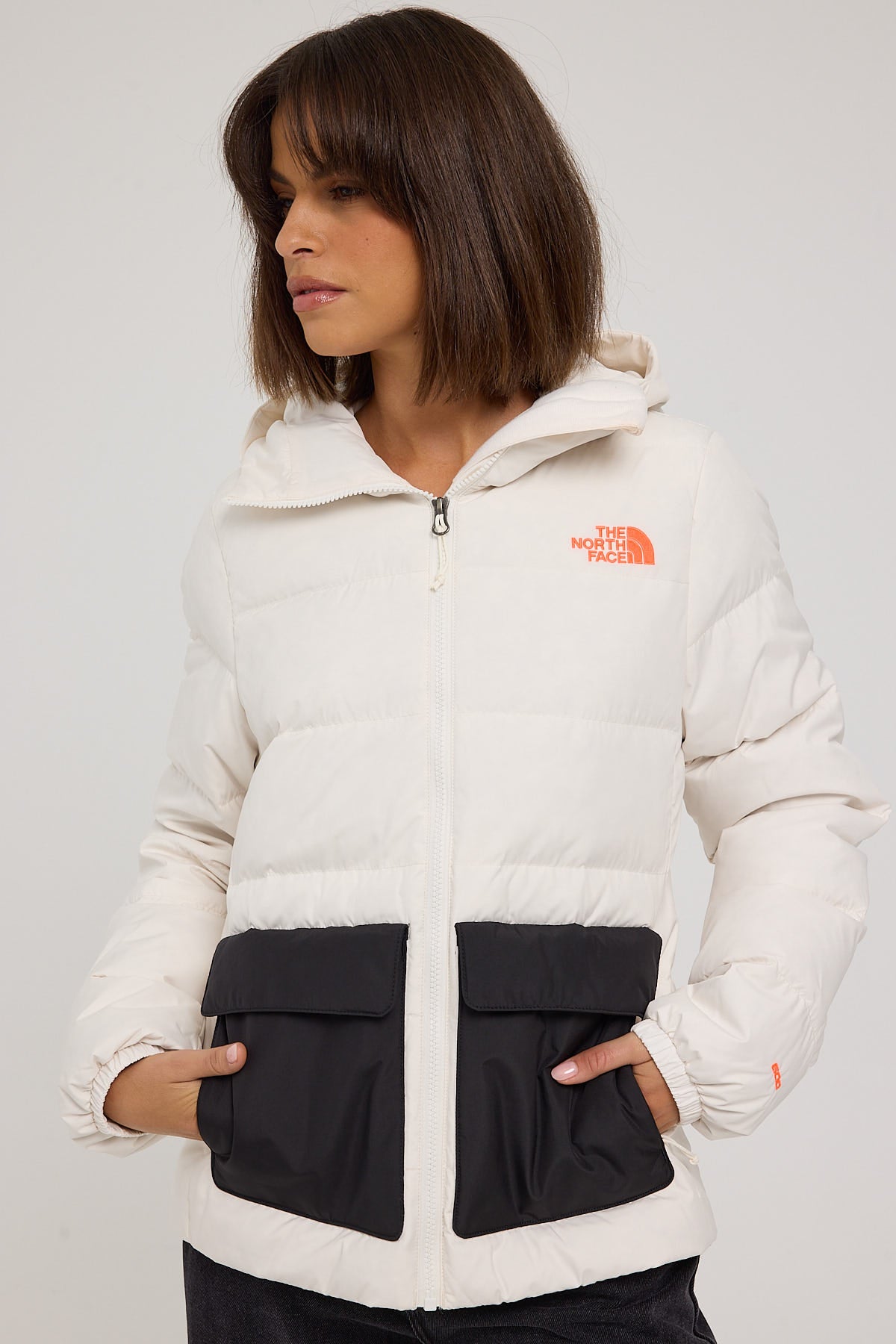 The North Face Women's Gotham Jacket Gardenia White/TNF Black/Orange