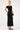 Perfect Stranger Draped Shoulder Knit Dress Black