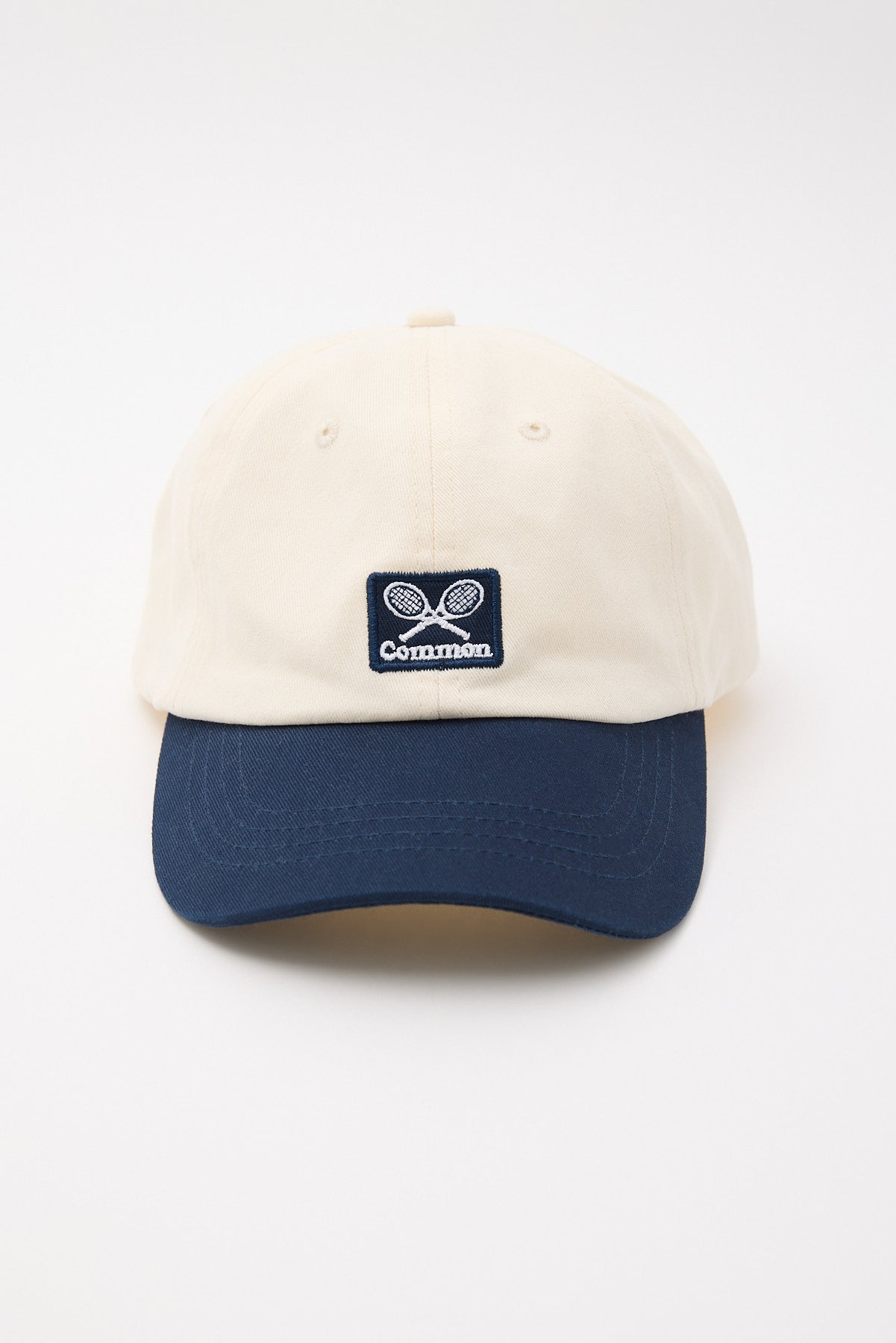 Common Need Racket Dad Cap Off White/Navy